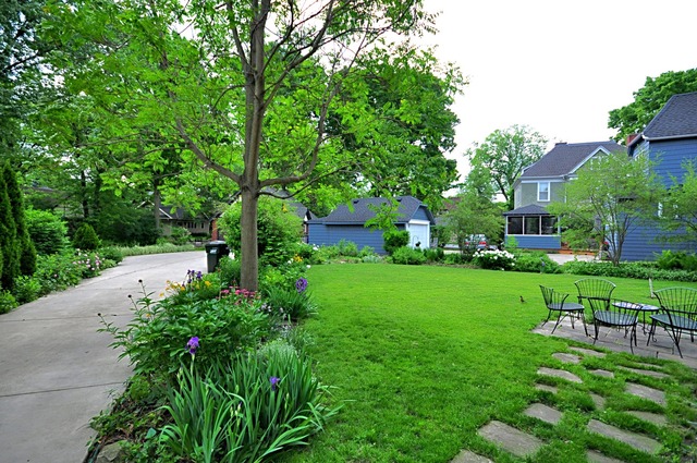 85 Akenside Road Riverside, IL 60546 - Photo 22 of 24 a view of a garden with plants and large trees