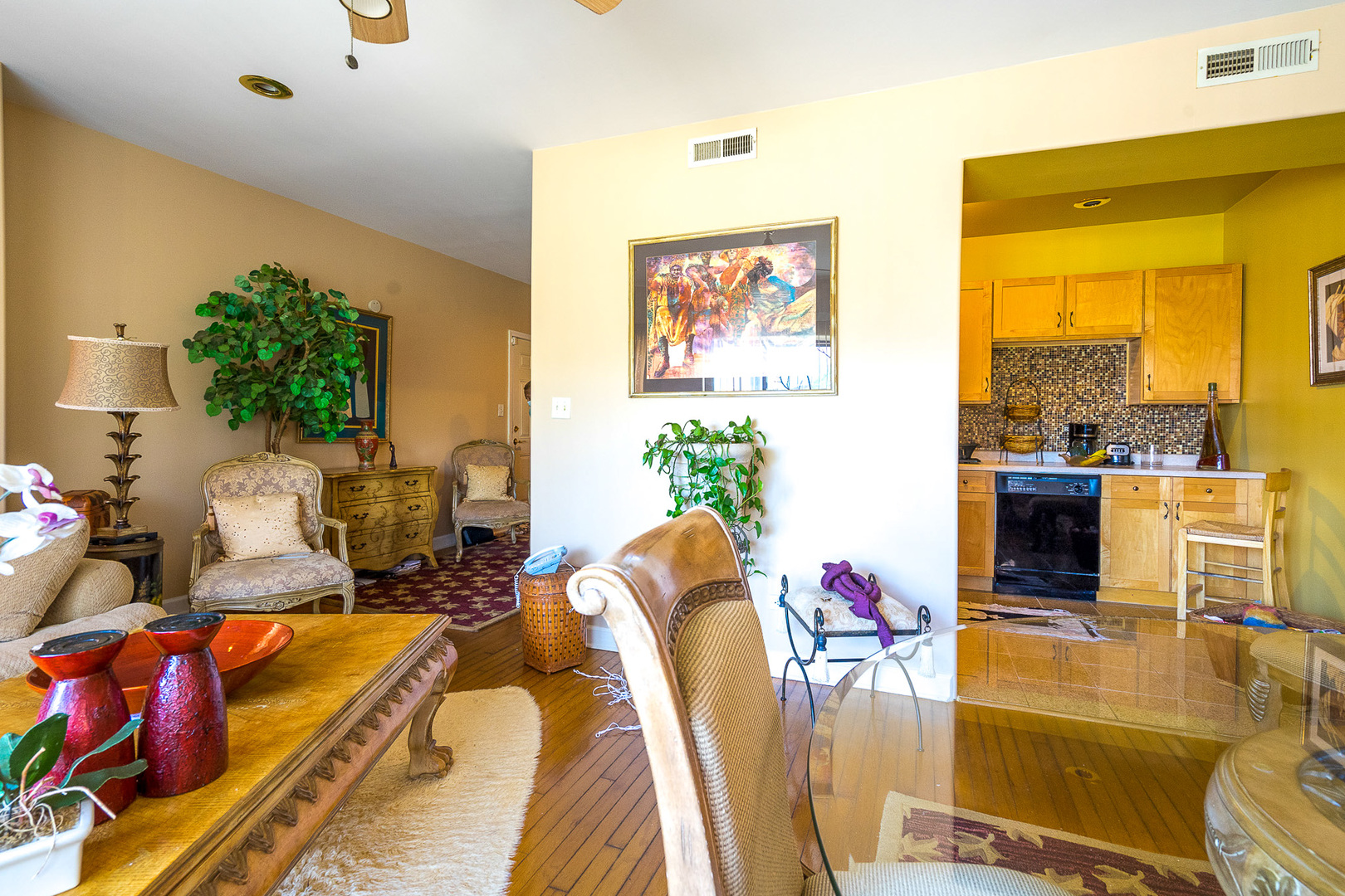 7645 South Yates Boulevard, Unit 1S Chicago, IL 60649 - Photo 10 of 23 a living room with furniture dining table and a floor to ceiling window