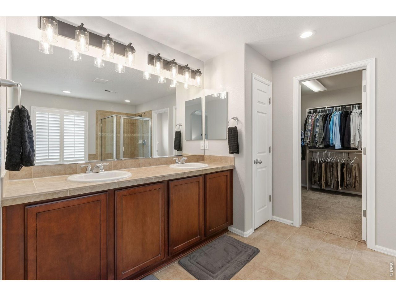 600 Botley Drive Windsor, CO 80550 - Photo 20 of 40 Double vanity and linen closet