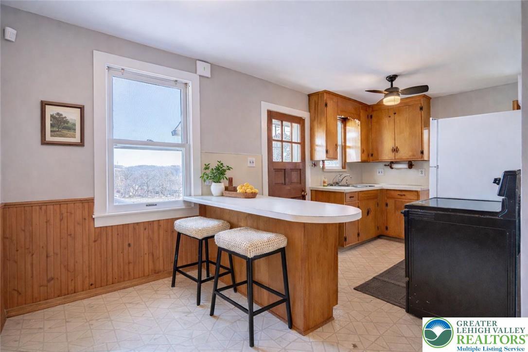 6245 Vera Cruz Road Emmaus, PA 18049 - Photo 19 of 72 a view of a dining room with furniture and window