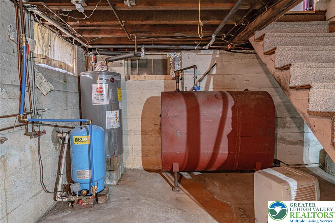 6245 Vera Cruz Road Emmaus, PA 18049 - Photo 50 of 72 a view of walk in closet with clothes and shoes