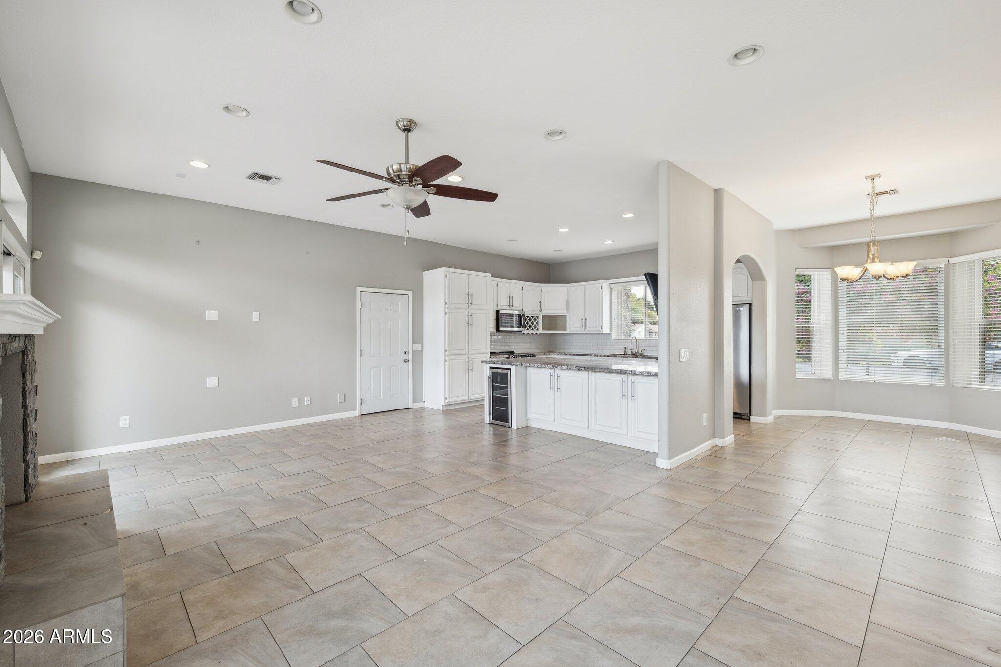 702 West Why Worry Lane Phoenix, AZ 85021 - Photo 14 of 53 a view of kitchen with furniture and window