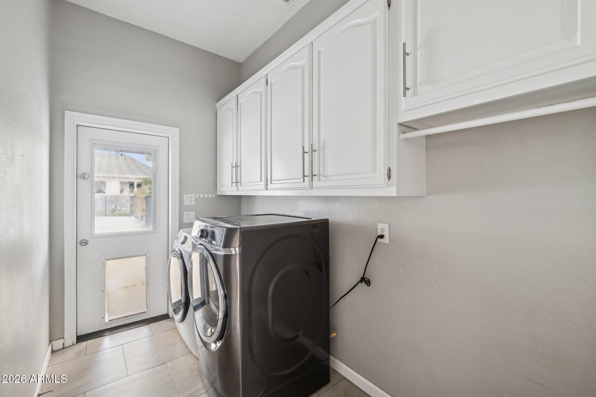702 West Why Worry Lane Phoenix, AZ 85021 - Photo 27 of 34 a utility room with dryer and washer