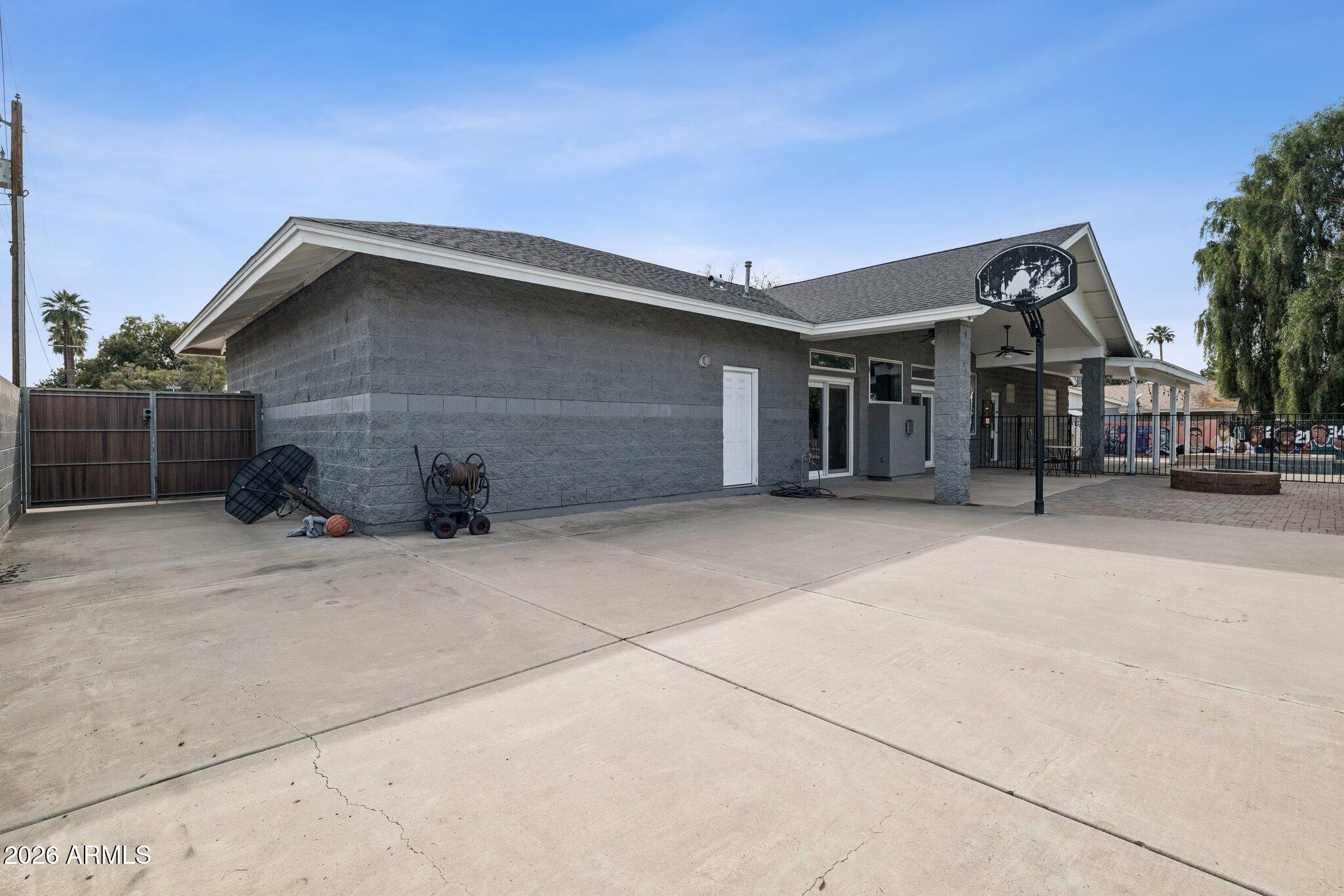 702 West Why Worry Lane Phoenix, AZ 85021 - Photo 42 of 53 a view of a house with a garage