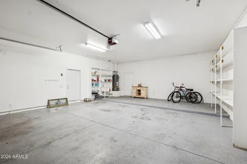 a building outdoor space with patio furniture and potted plants