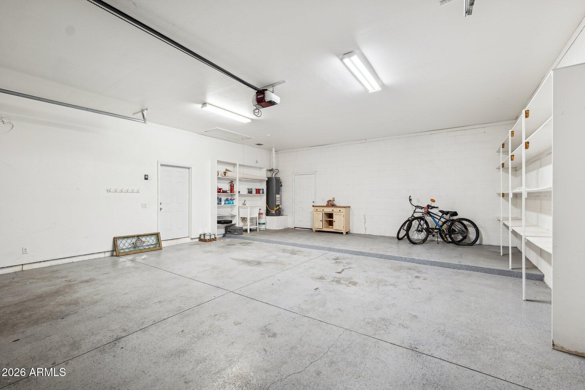 702 West Why Worry Lane Phoenix, AZ 85021 - Photo 47 of 53 a view of a garage with furniture