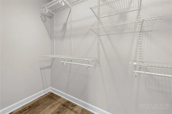 a view of a room with racks on the wall