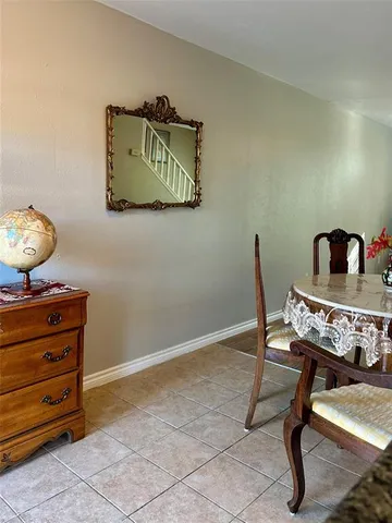 a view of a workspace with furniture