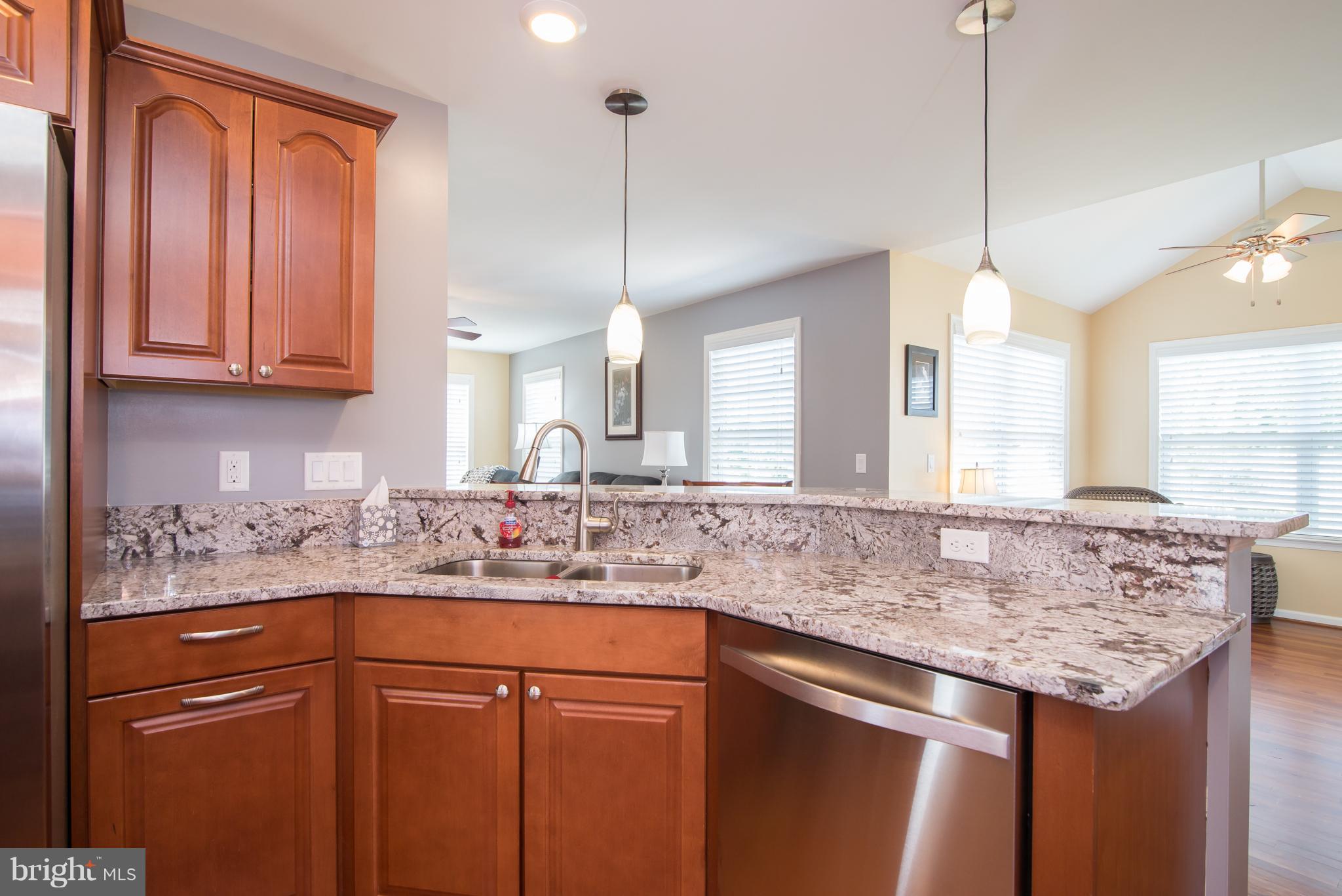 41 Houston Road Inwood, WV 25428 - Photo 9 of 30 a kitchen with granite countertop cabinets sink and window