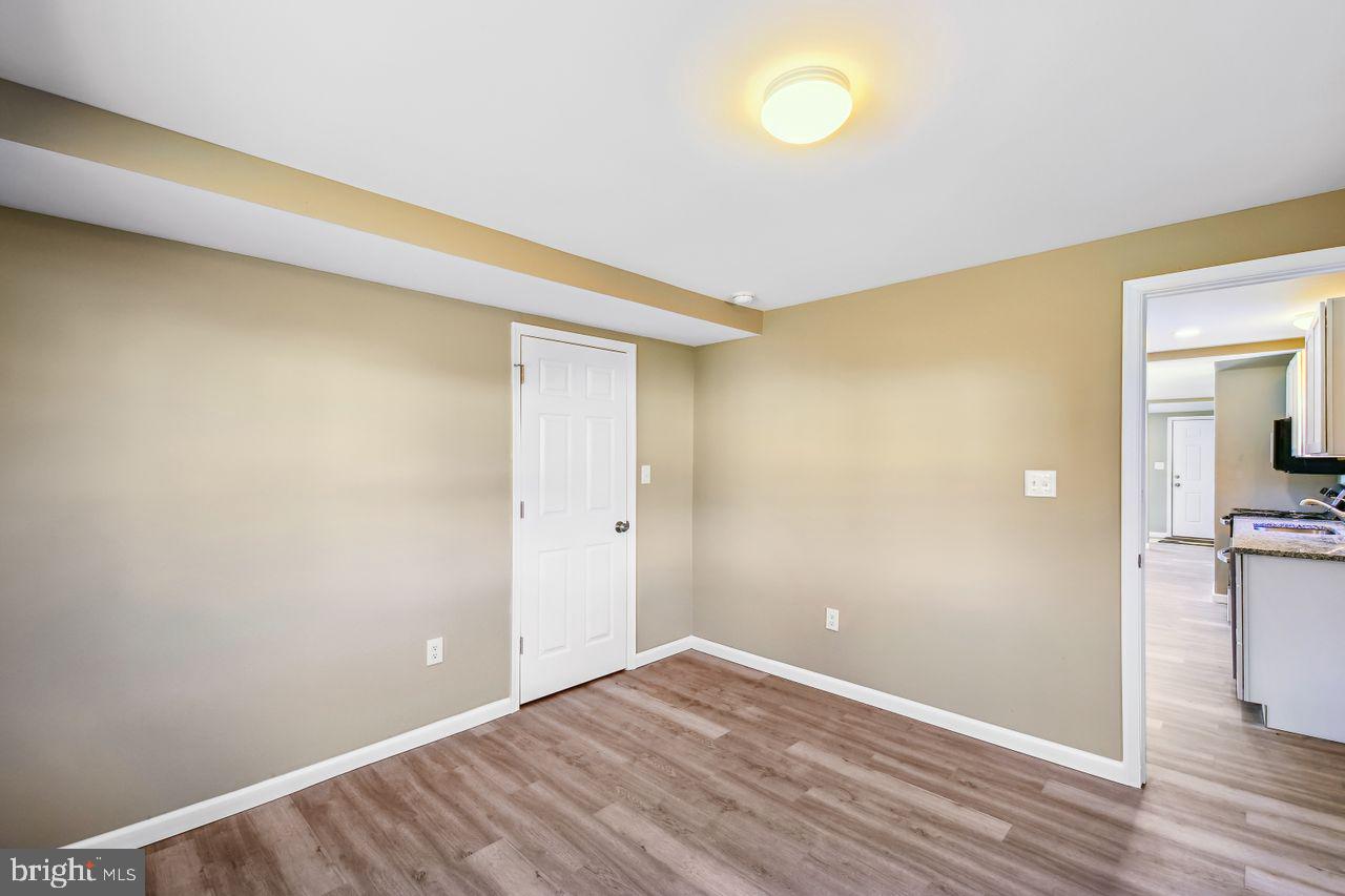 4912 Ocean Gateway Vienna, MD 21869 - Photo 15 of 35 a view of empty room with wooden floor