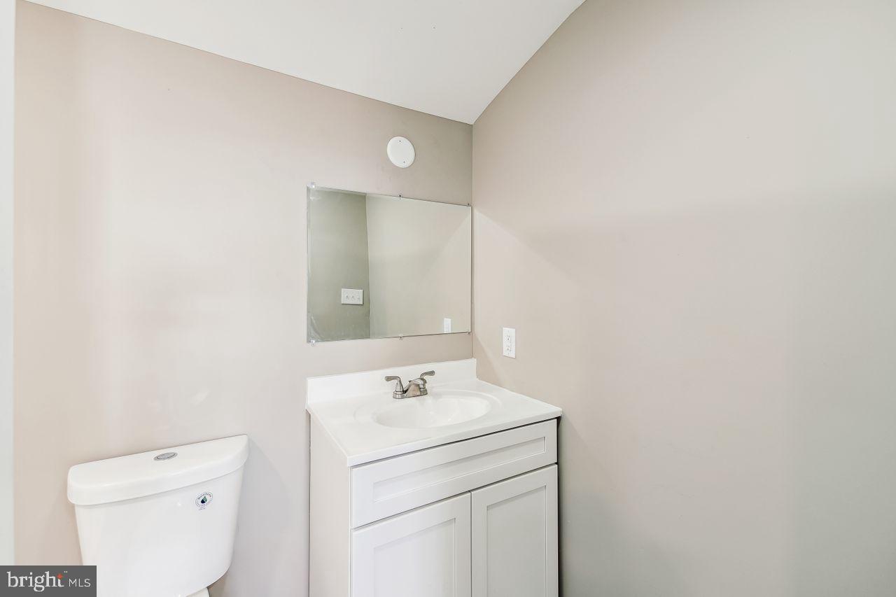 4912 Ocean Gateway Vienna, MD 21869 - Photo 20 of 35 a bathroom with a sink and a toilet