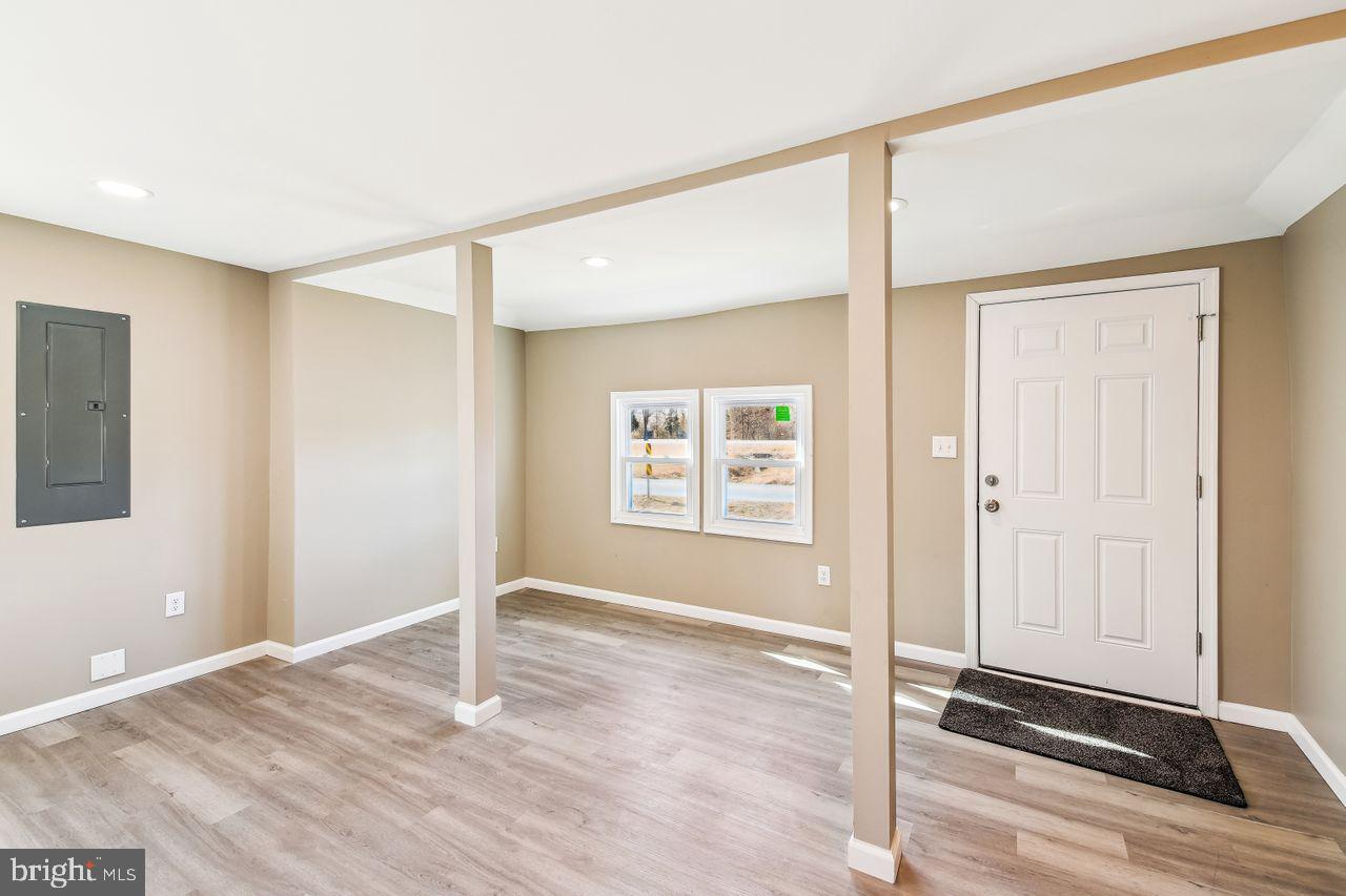 4912 Ocean Gateway Vienna, MD 21869 - Photo 5 of 35 a view of an empty room with wooden floor