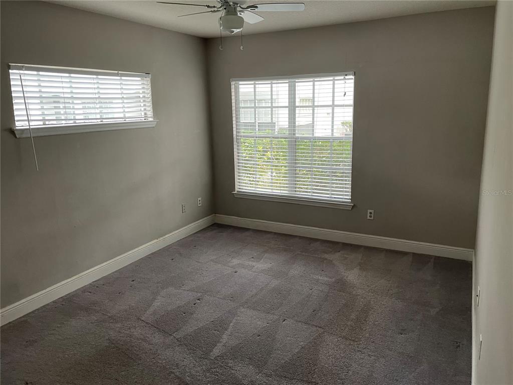 4356 South Kirkman Road, Unit 501 Orlando, FL 32811 - Photo 15 of 19 an empty room with a window