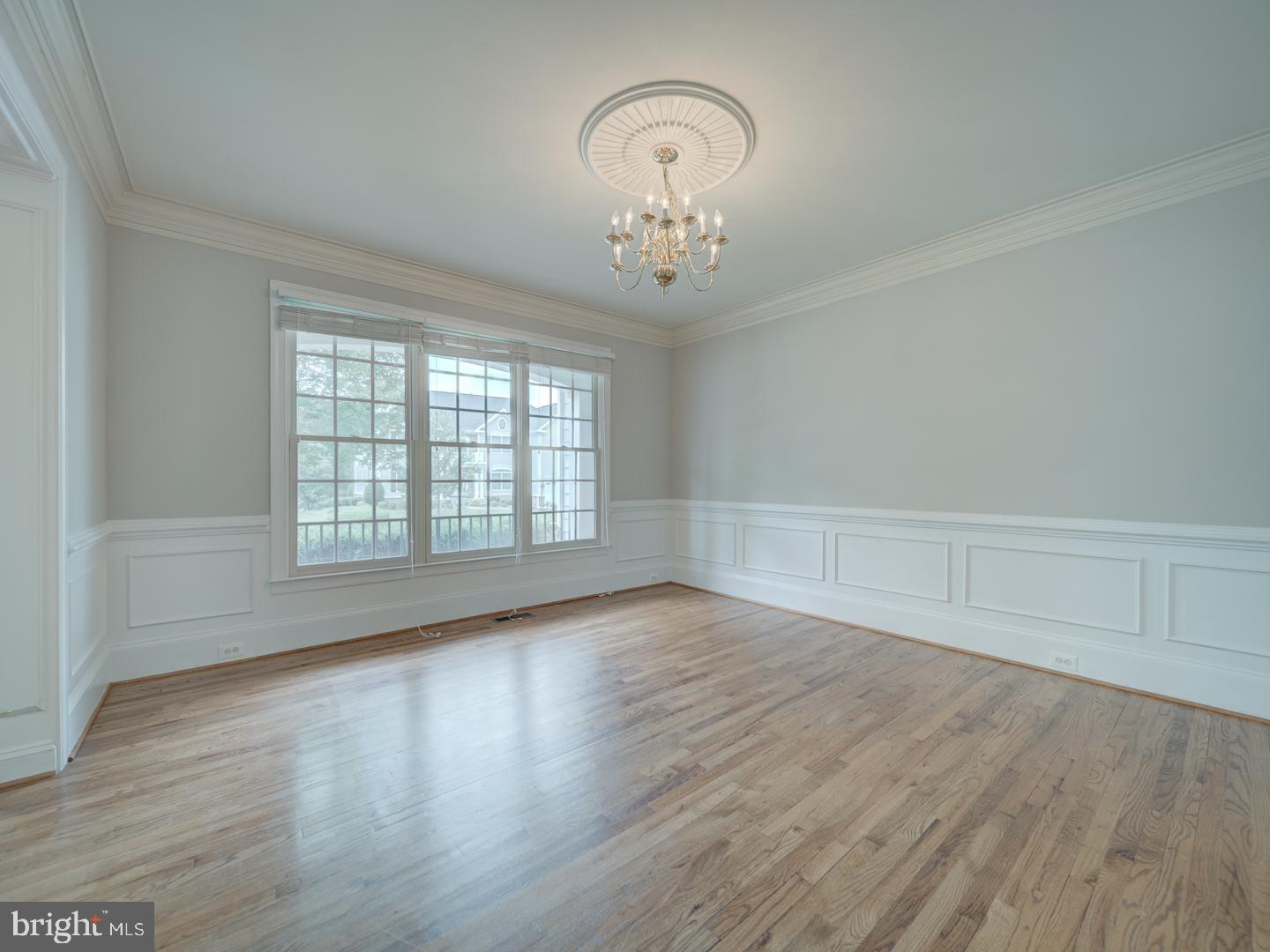 8429 Link Hills Loop Gainesville, VA 20155 - Photo 16 of 102 wooden floor in an empty room with a window
