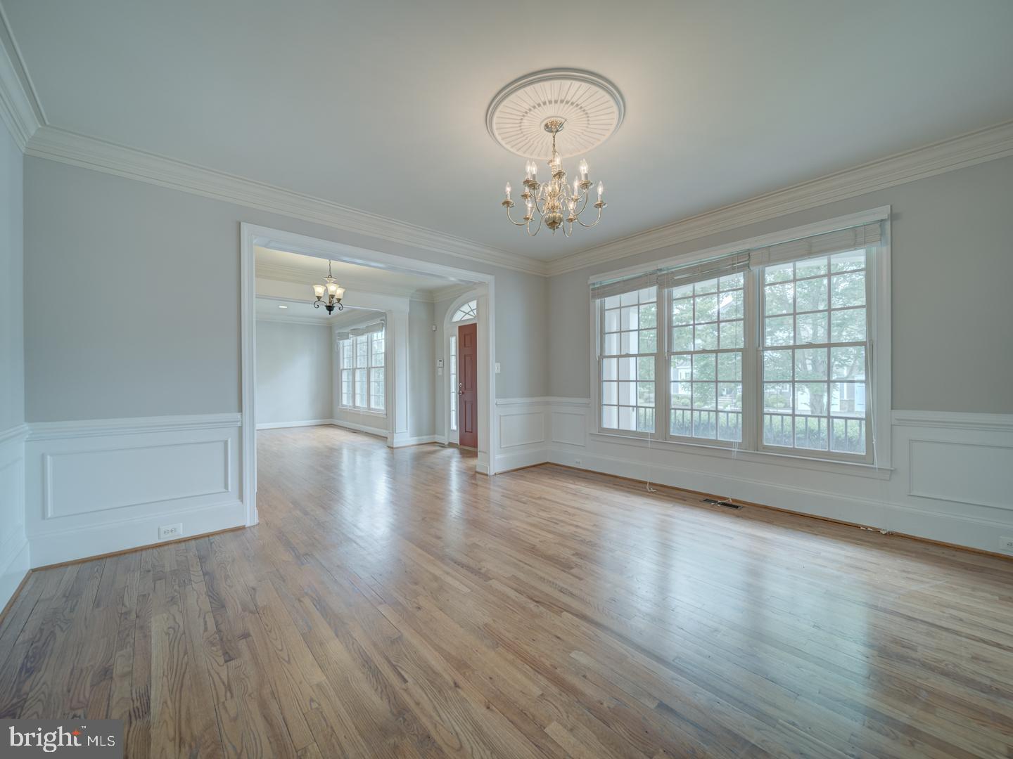 8429 Link Hills Loop Gainesville, VA 20155 - Photo 17 of 102 wooden floor in an empty room with a window