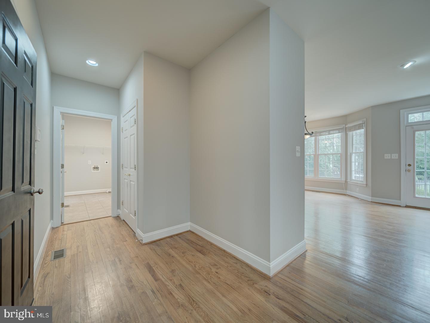 8429 Link Hills Loop Gainesville, VA 20155 - Photo 44 of 102 wooden floor in an empty room with a window