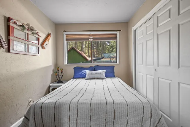 a bathroom with a sink toilet and mirror