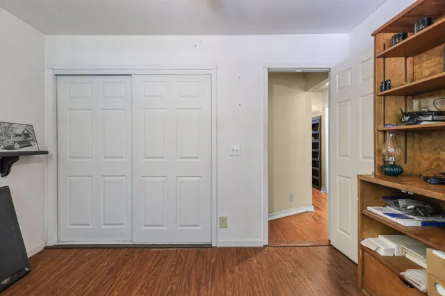 a room with bunk bed and a chandelier