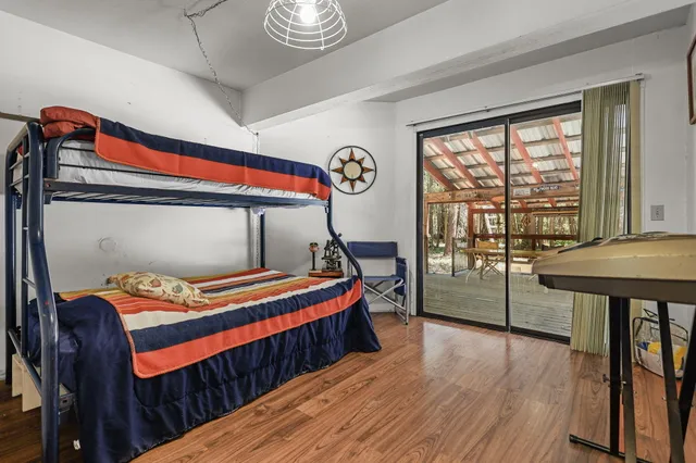 a view of outdoor space with deck and wooden floor