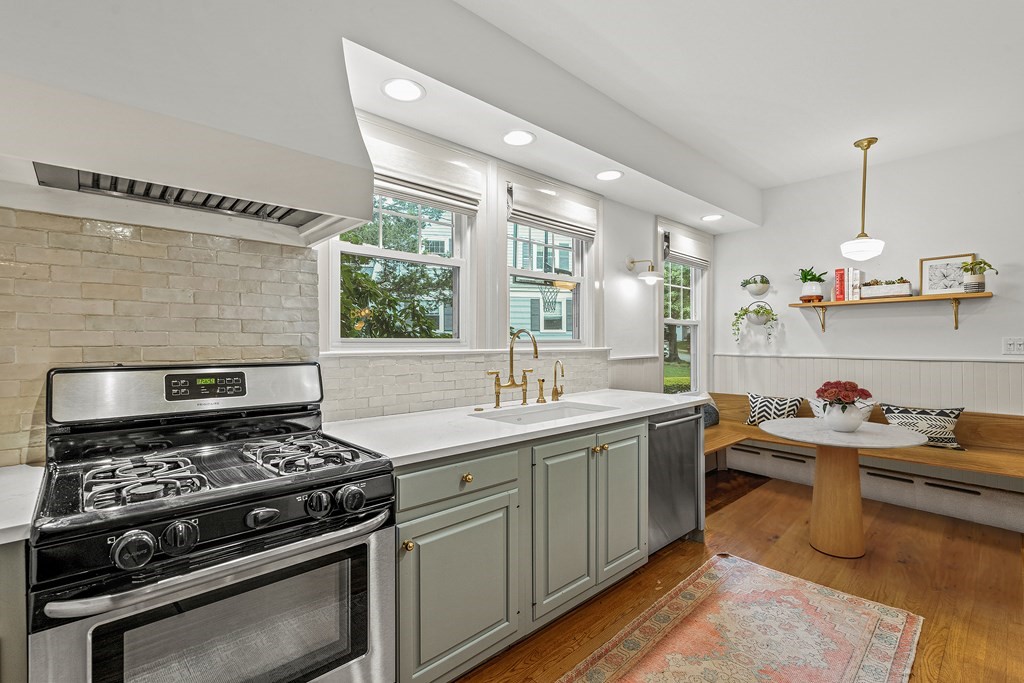 19 Edgehill Road Winchester, MA 01890 - Photo 13 of 42 a kitchen that has a sink and a stove