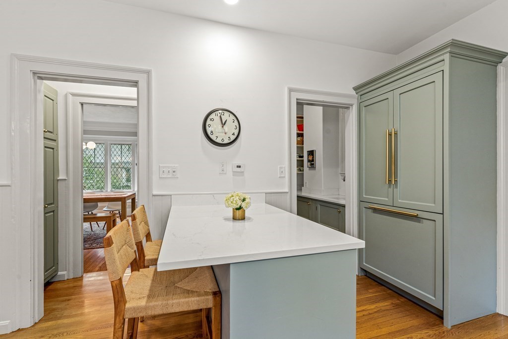 19 Edgehill Road Winchester, MA 01890 - Photo 16 of 42 a view of a kitchen area with furniture and wooden floor