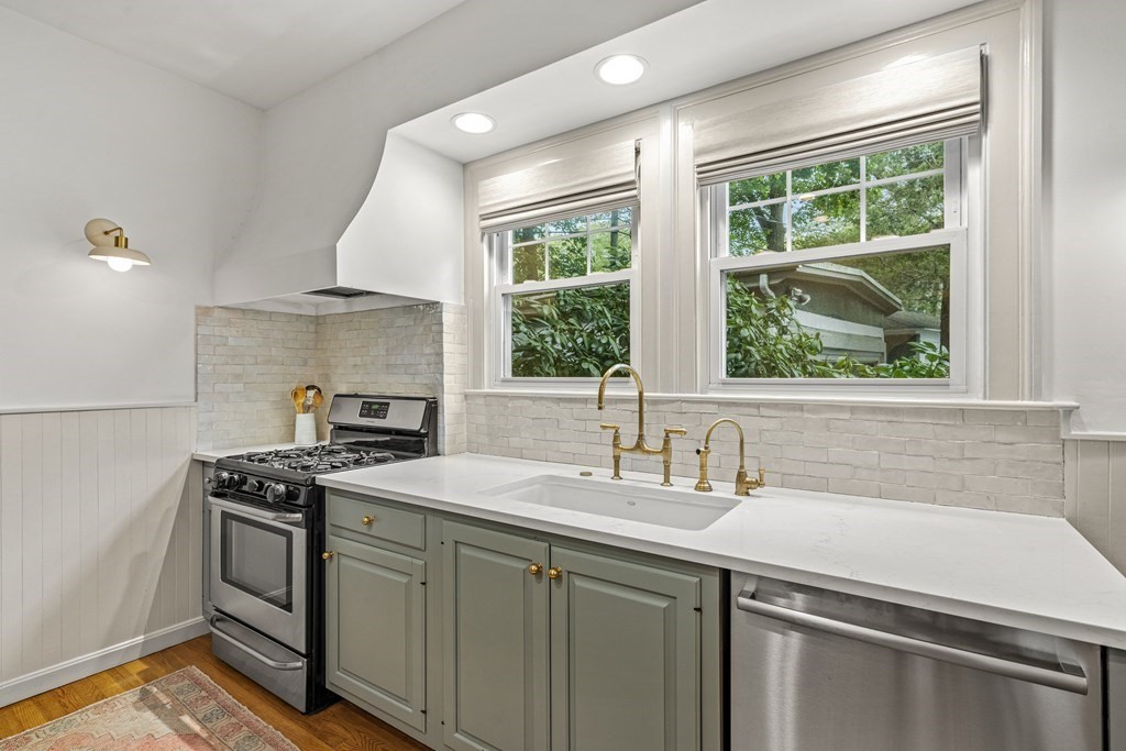 19 Edgehill Road Winchester, MA 01890 - Photo 17 of 42 a kitchen with a sink stove and window