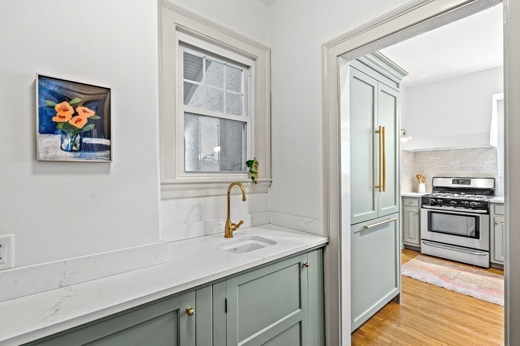 19 Edgehill Road Winchester, MA 01890 - Photo 19 of 42 a kitchen with a sink and a stove