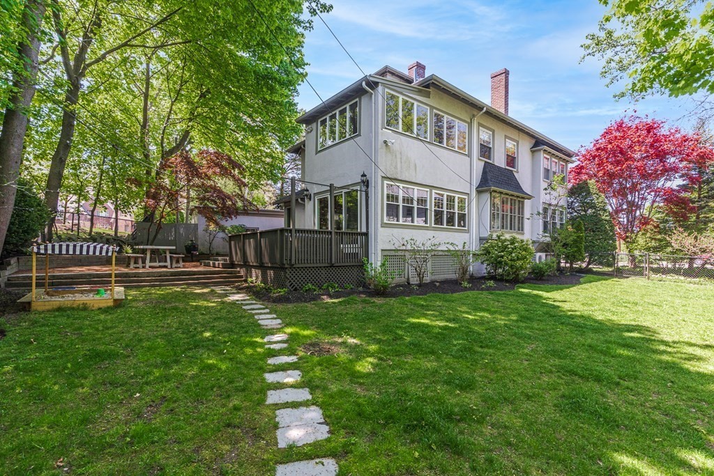 19 Edgehill Road Winchester, MA 01890 - Photo 2 of 42 a front view of a house with a yard