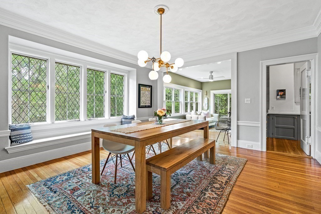19 Edgehill Road Winchester, MA 01890 - Photo 21 of 42 a view of a living room and kitchen with a table or chairs