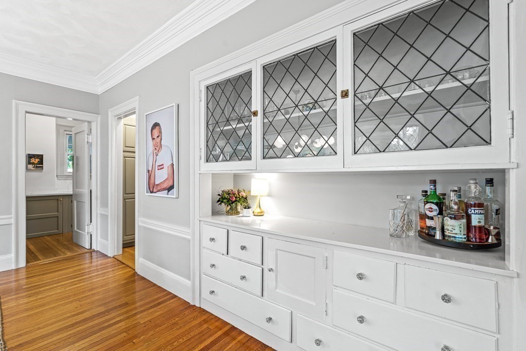 19 Edgehill Road Winchester, MA 01890 - Photo 23 of 42 a kitchen with white cabinets and window