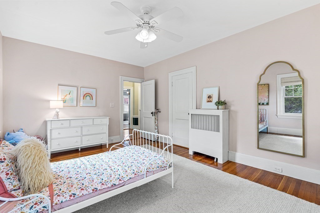 19 Edgehill Road Winchester, MA 01890 - Photo 32 of 42 a bedroom with a bed and a dresser