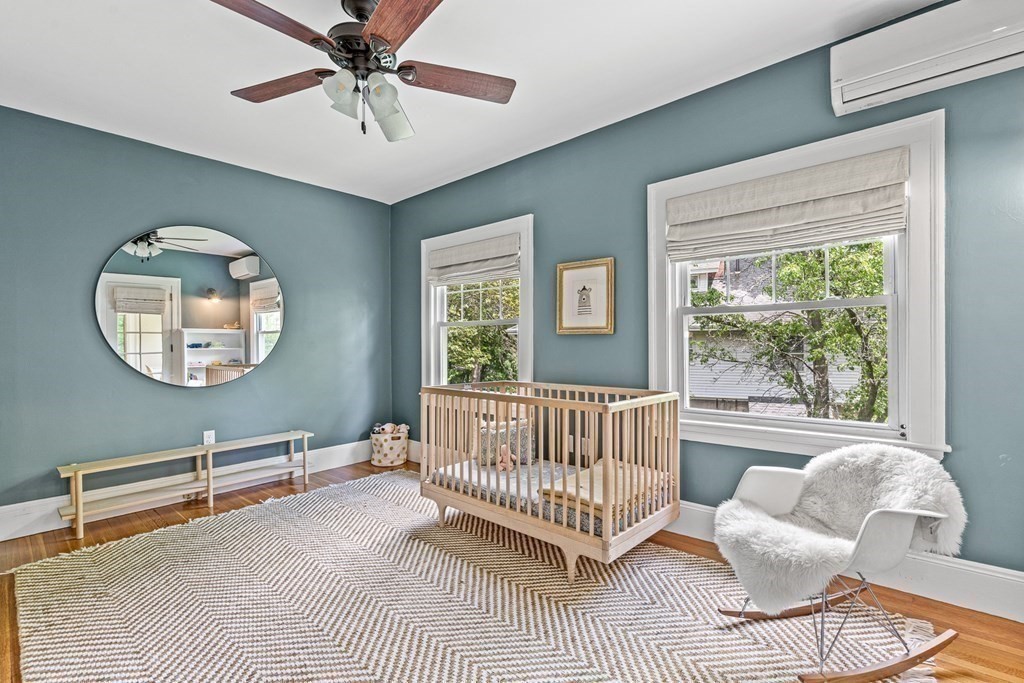 19 Edgehill Road Winchester, MA 01890 - Photo 35 of 42 a living room with furniture a table and a large window