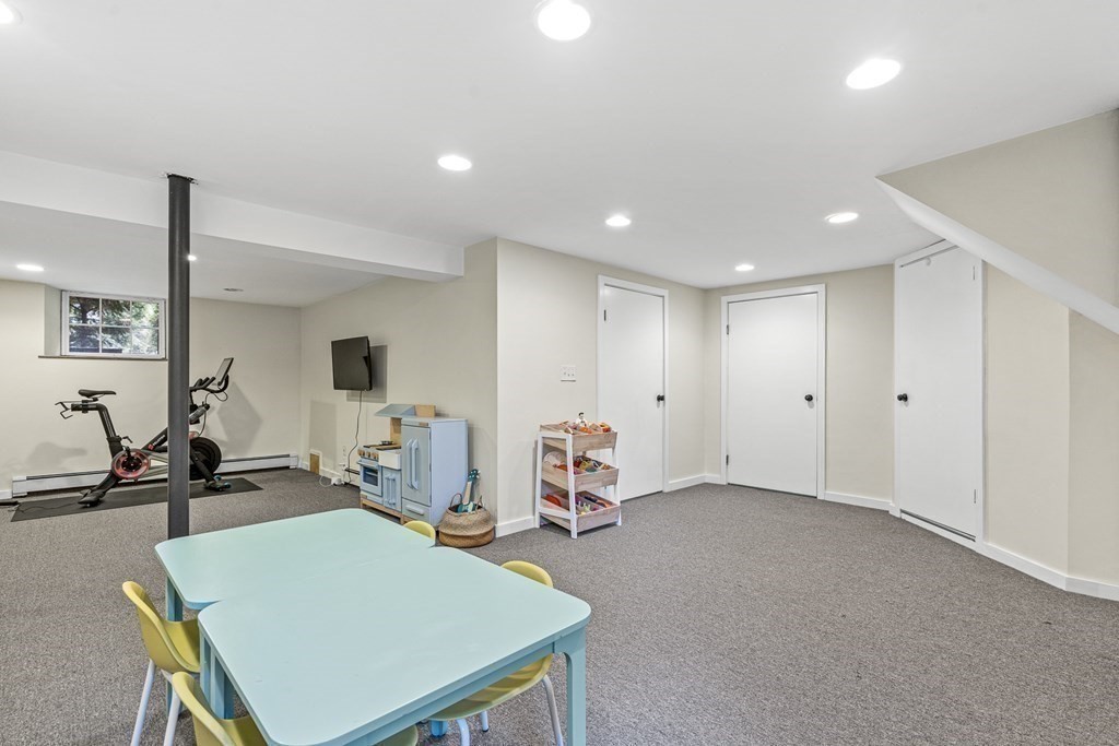 19 Edgehill Road Winchester, MA 01890 - Photo 40 of 42 a view of a room with gym equipment