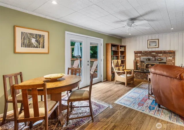 a workspace with furniture and wooden floor