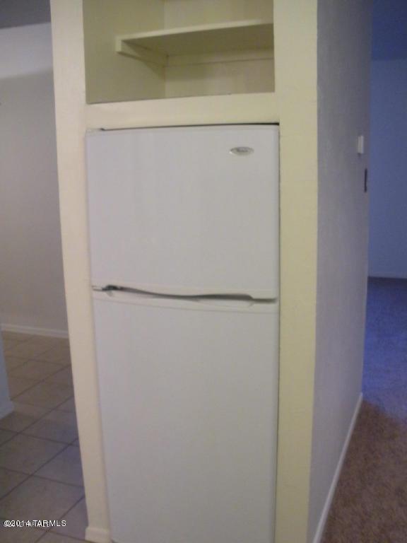 1600 North Wilmot Road, Unit 245 Tucson, AZ 85712 - Photo 4 of 12 a close up of a refrigerator
