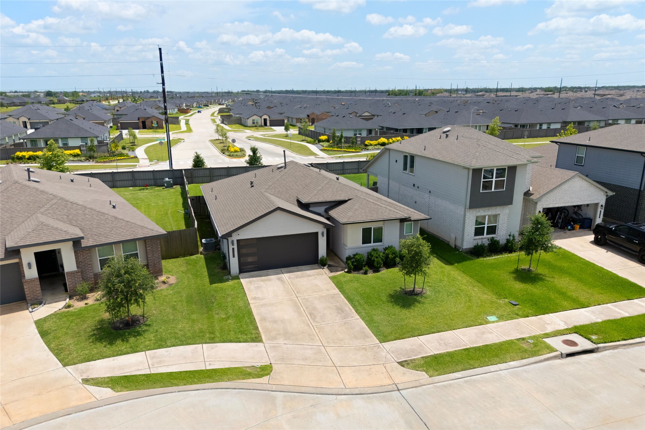 1134 Della Lane Rosharon, TX 77583 - Photo 3 of 23 a aerial view of a house with a garden and plants