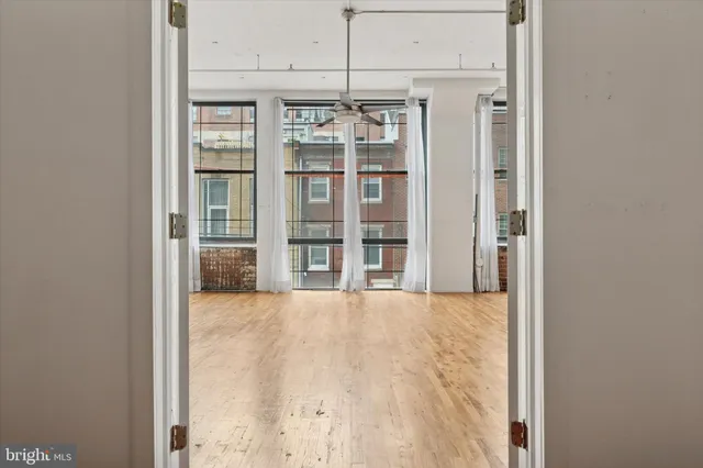 a view of empty room with windows