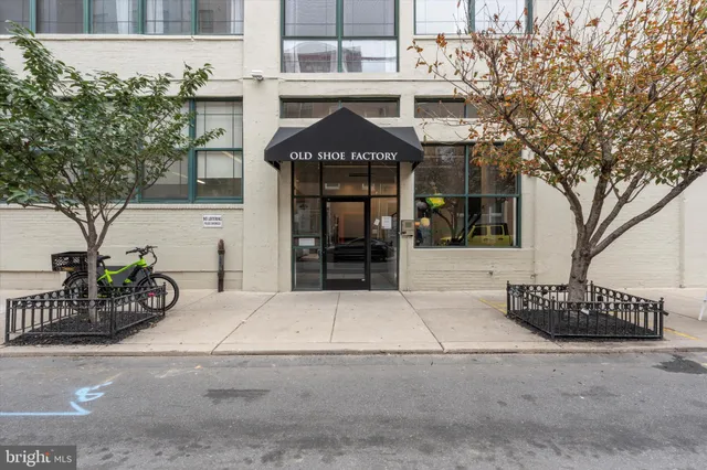 a front view of a house with garage