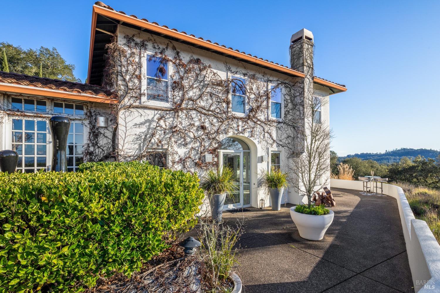 675 Shiloh Canyon Santa Rosa, CA 95403 - Photo 2 of 26 a front view of a house with garden