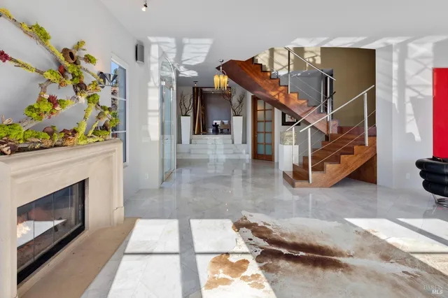 a view of entryway livingroom and hall