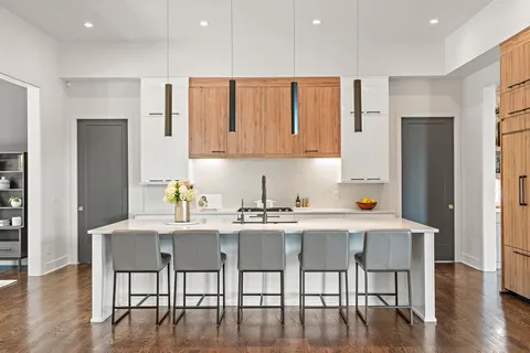 a view of a chair and table in the balcony