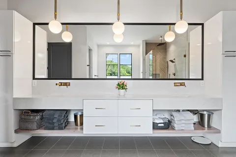 a room with furniture cabinets and a window