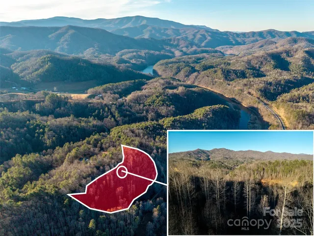 an aerial view of residential houses and outdoor space