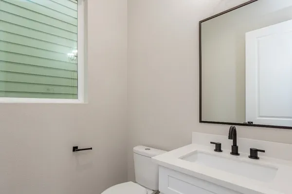 a bathroom with a sink and a toilet
