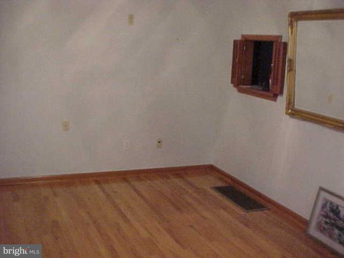 22118 Seldom Seen Road Southwest Lonaconing, MD 21539 - Photo 12 of 15 a view of an empty room