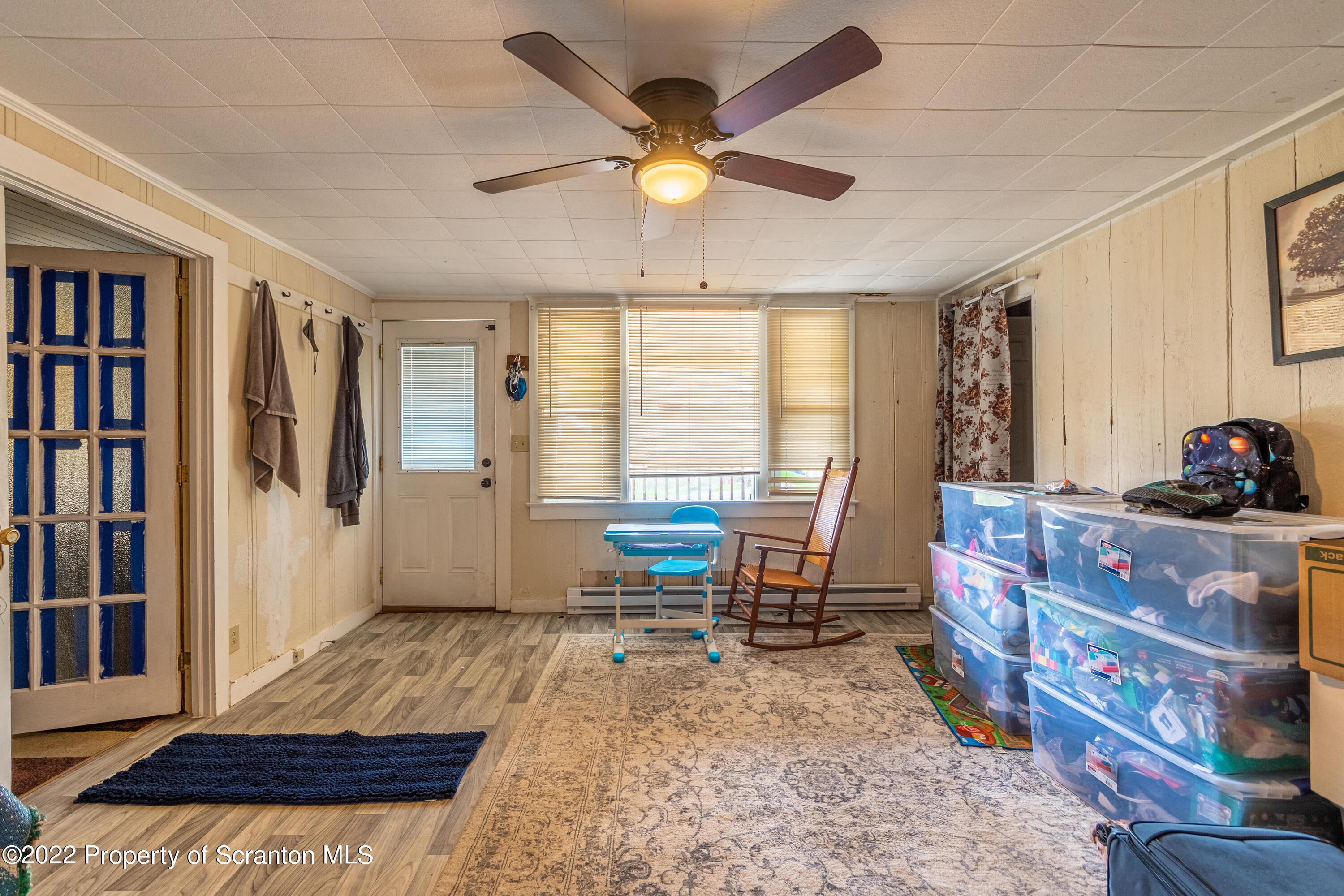 184 Crescent Lake Road Scotrun, PA 18355 - Photo 13 of 38 a living room with furniture and a window