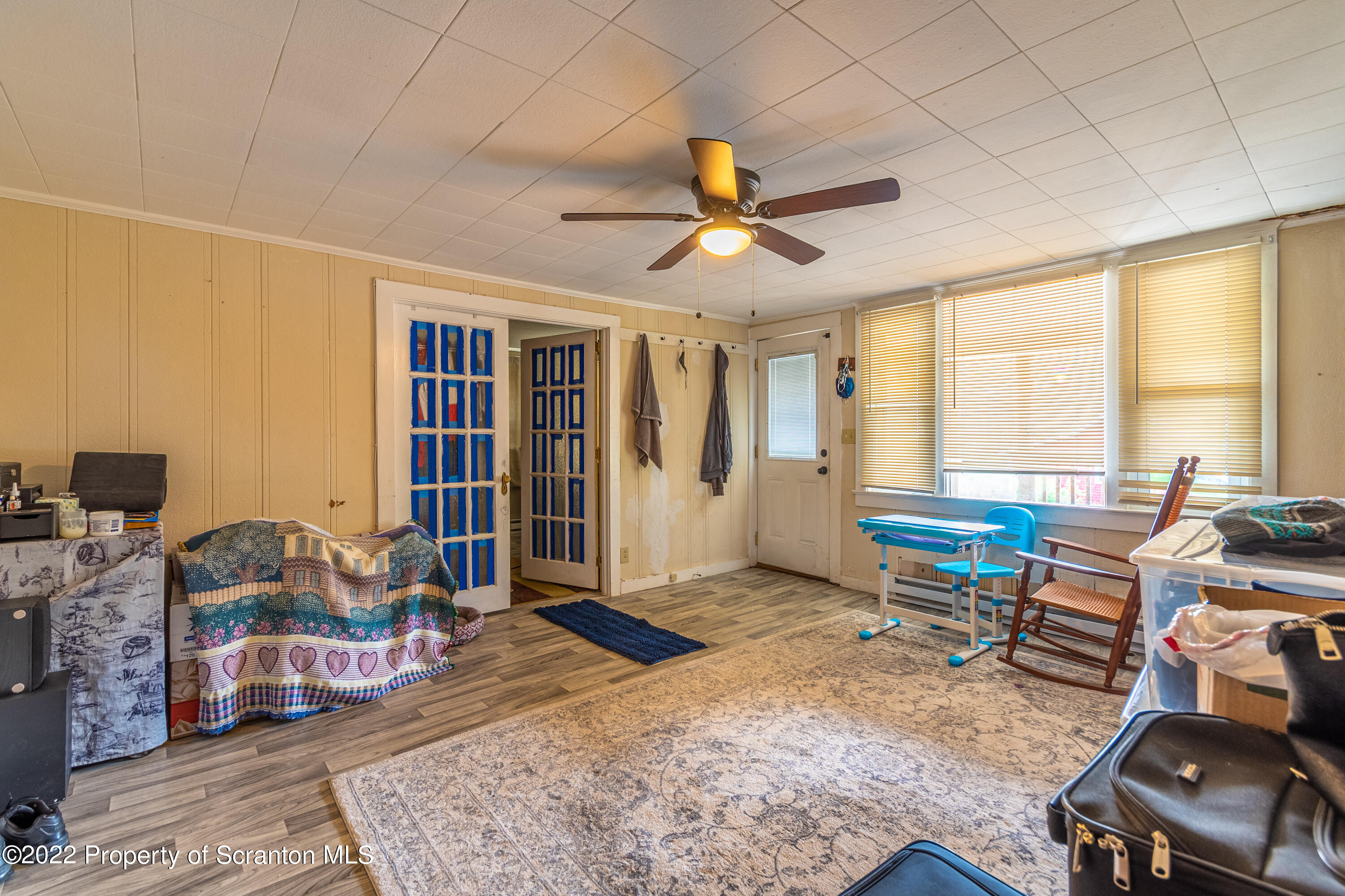184 Crescent Lake Road Scotrun, PA 18355 - Photo 14 of 38 a living room with furniture a window and a table