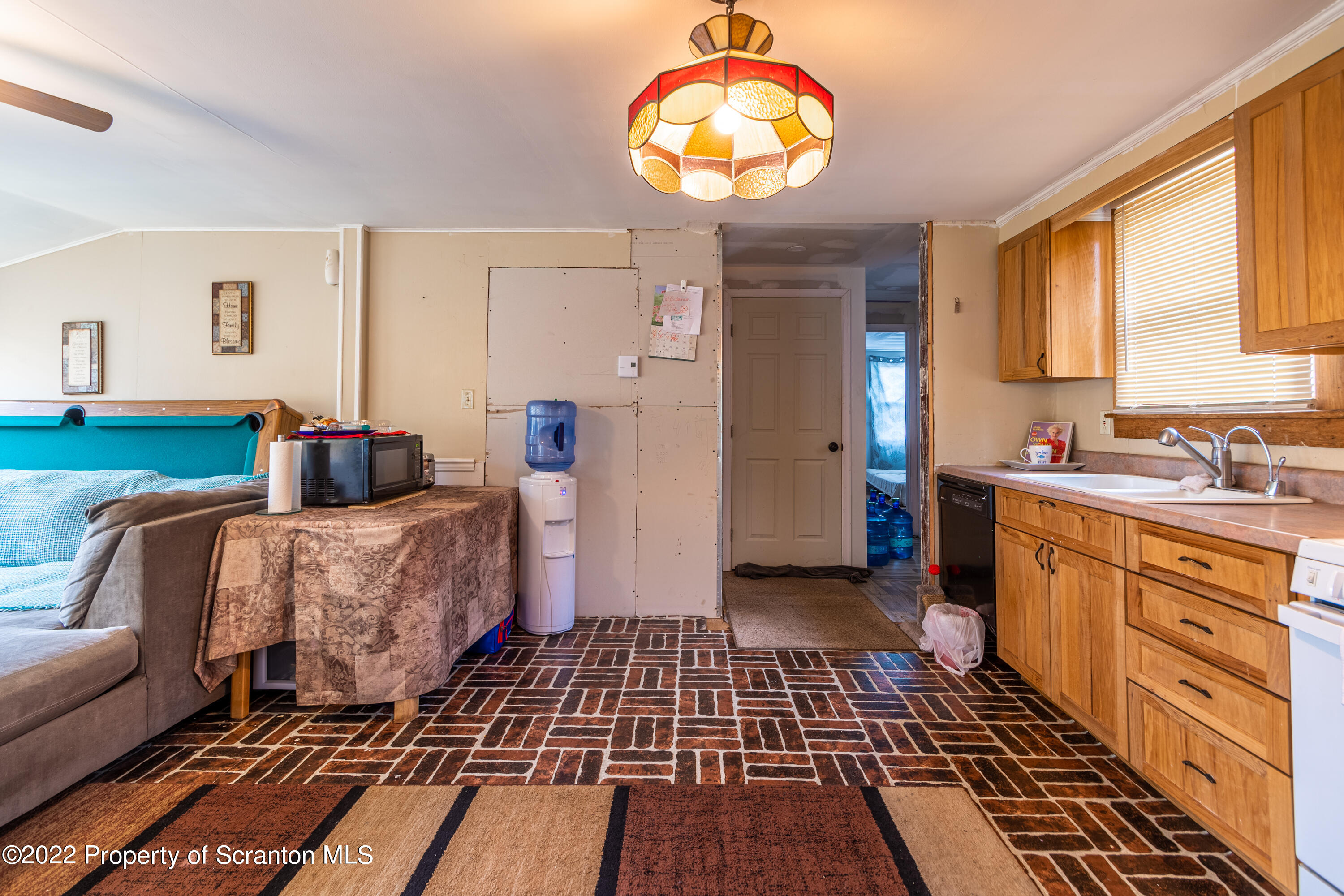 184 Crescent Lake Road Scotrun, PA 18355 - Photo 19 of 38 a bedroom with furniture and a window