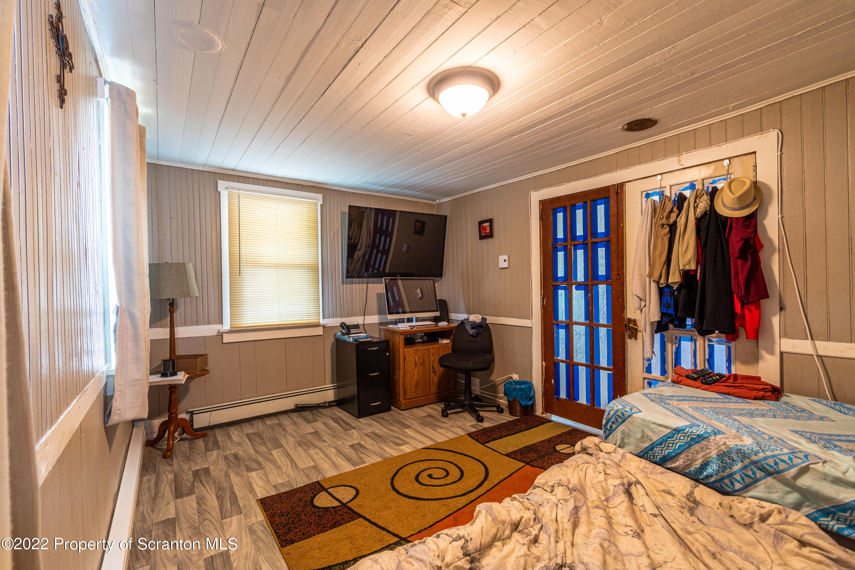 184 Crescent Lake Road Scotrun, PA 18355 - Photo 23 of 38 a bed room with a bed and a window