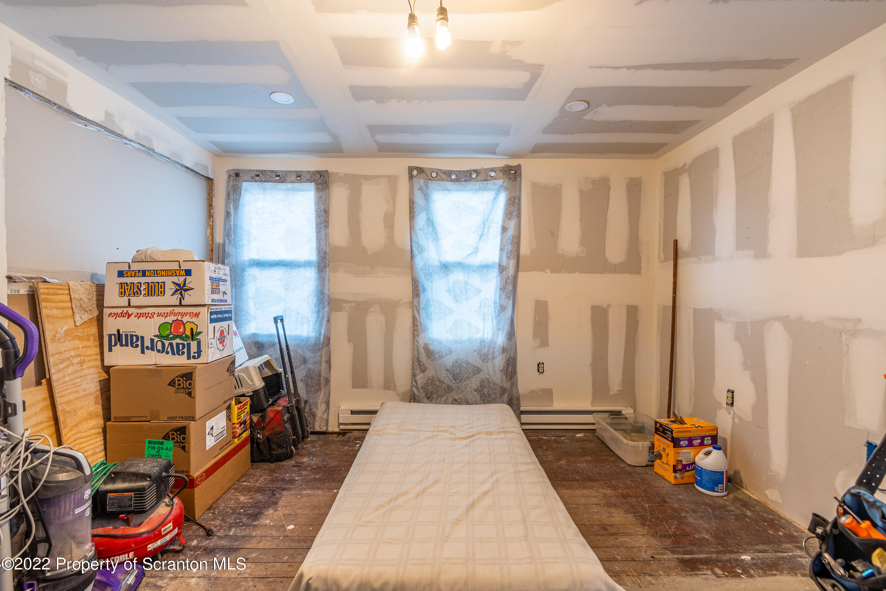 184 Crescent Lake Road Scotrun, PA 18355 - Photo 27 of 38 a bed room with a bed and a window
